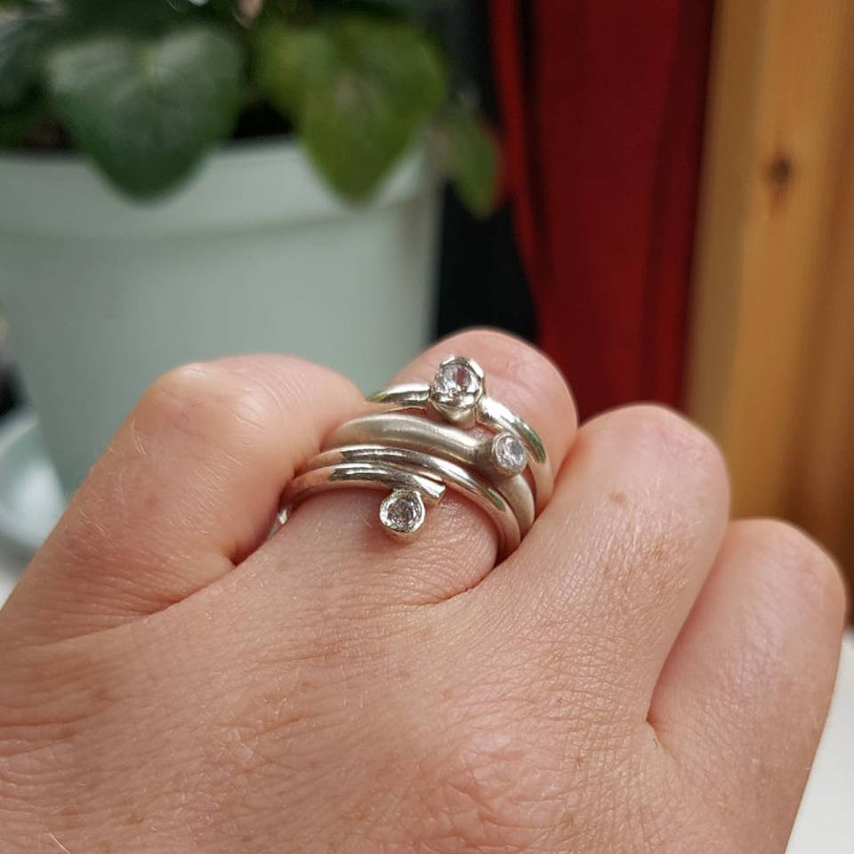 silver engagement ring worn