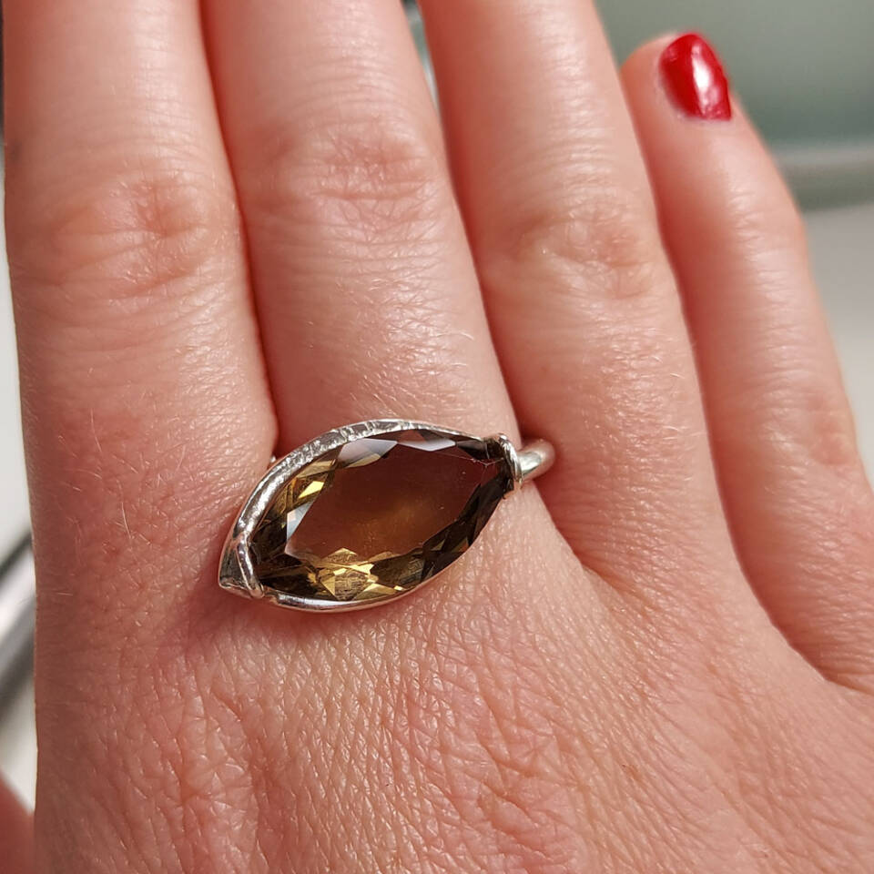 smokey quartz ring worn on finger