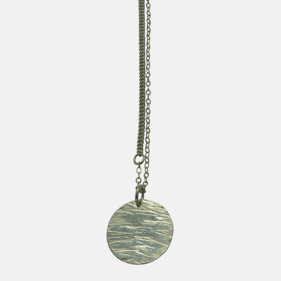 textured silver medallion pendant