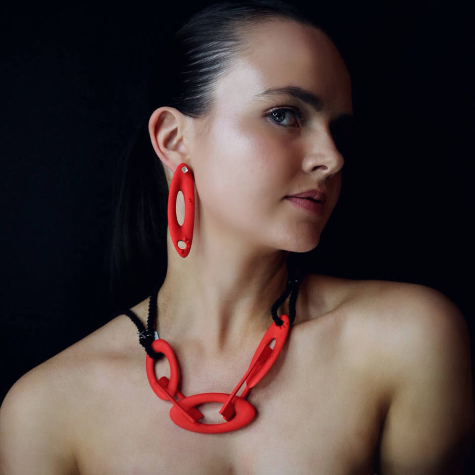 red oval earrings with chain necklace