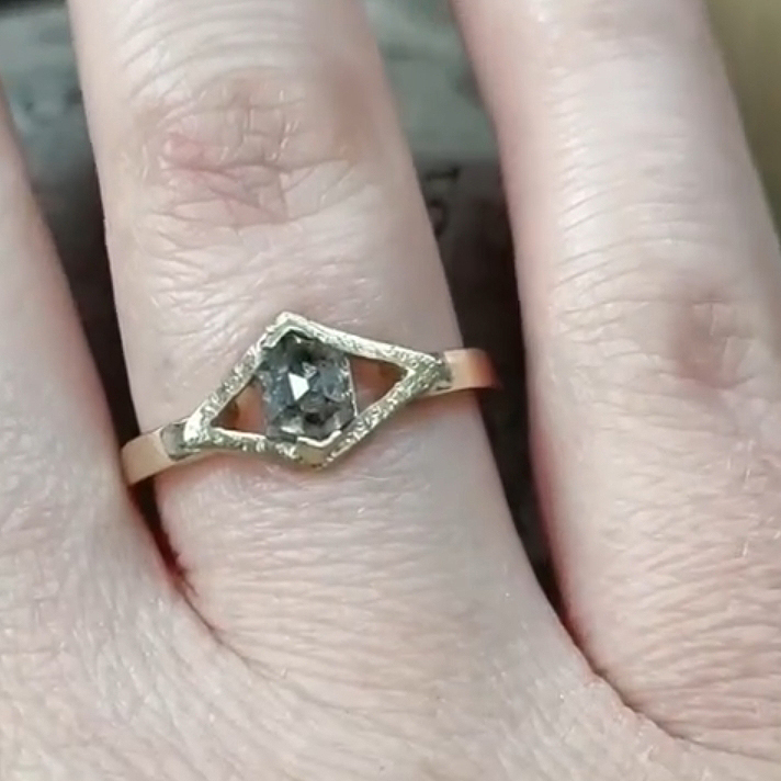 alternative-engagement-ring-9ct-yellow-gold-hexagon-salt-and-pepper-diamond-worn-on-finger