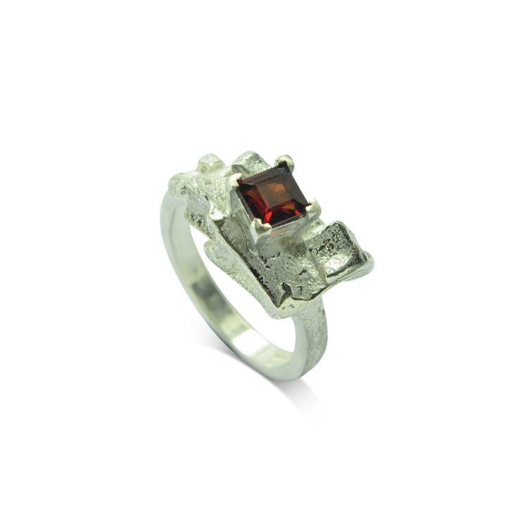 pyramid silver rock formation ring with square garnet